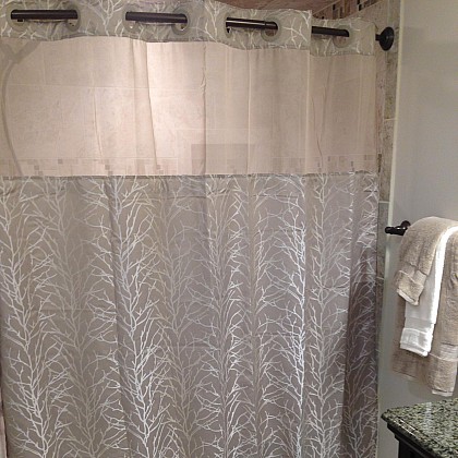 Hookless Jacquard Tree Branch Shower Curtain in Taupe. View a larger version of this product image.