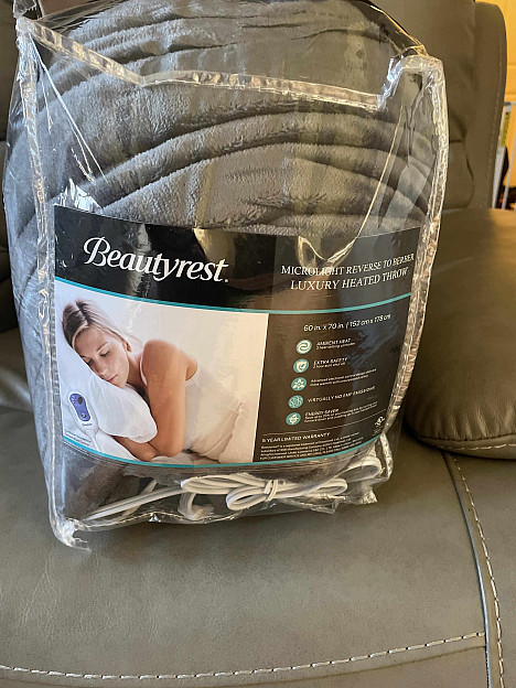 Beautyrest&reg; Berber Solid Microlight Heated Throw Blanket. View a larger version of this product image.