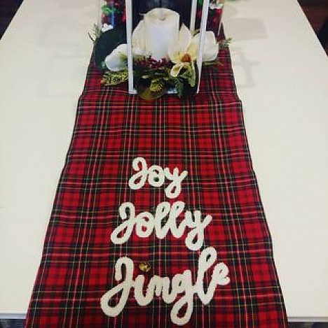 Bee &amp; Willow&trade; Holiday Joy Jolly Jingle Table Runner. View a larger version of this product image.