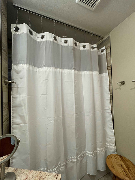 Hookless&reg; Escape Fabric Shower Curtain and Snap-in Liner Set. View a larger version of this product image.