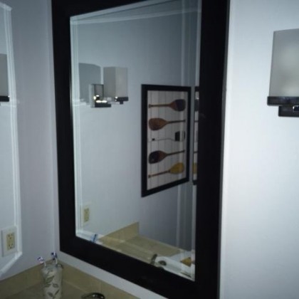 Decorative 42.25-Inch x 30.25-Inch Wall Mirror in Black. View a larger version of this product image.