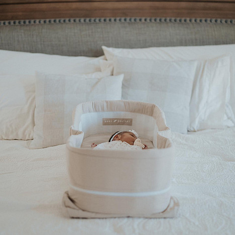 Baby Delight&reg; Snuggle Nest&trade; Organic Portable Infant Lounger in Oatmeal. View a larger version of this product image.