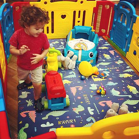 Baby Care&trade; Good Dinosaur Reversible Multicolor Playmat. View a larger version of this product image.