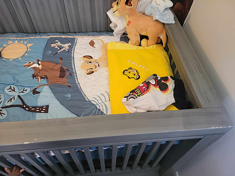 Lambs &amp; Ivy&reg; Lion King Adventure 3-Piece Crib Bedding Set in Blue/Brown. View a larger version of this product image.